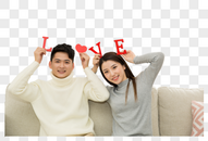 居家情侣手拿love道具图片