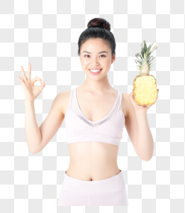 运动健身美女手拿菠萝图片