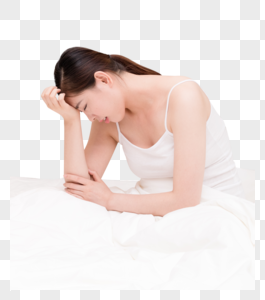 年轻女性失眠头痛坐在床上图片