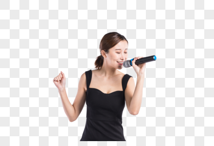 年轻女性手持话筒唱歌高清图片