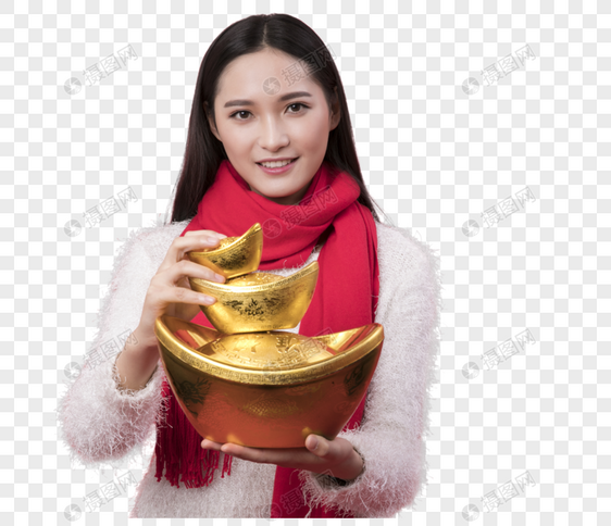 拿着金元宝的女性新年人像特写图图片
