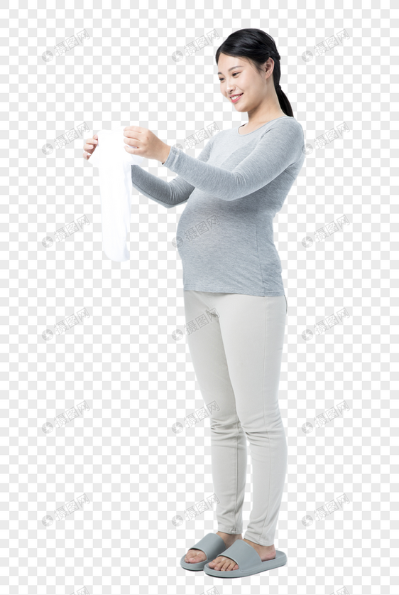 孕妇拿着婴儿衣物图片