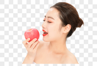 年轻美女吃苹果图片