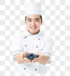 厨师拿着蓝莓高清图片