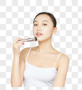 女性使用粉底刷图片