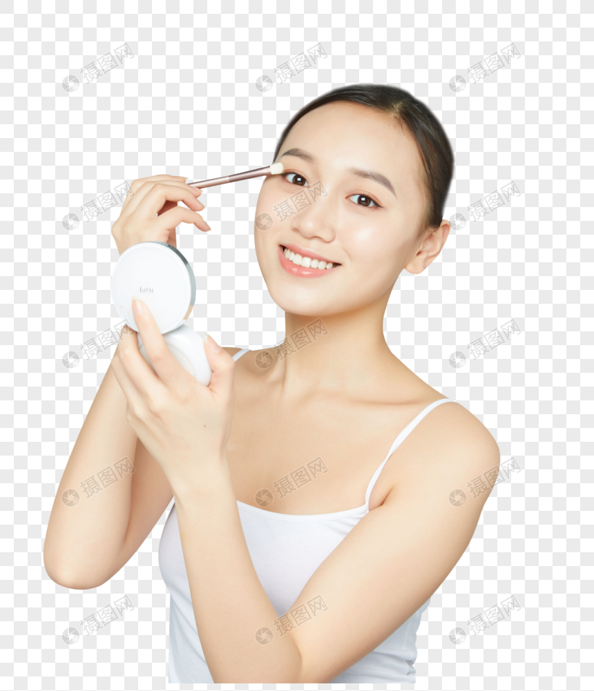 女性使用眼影刷图片