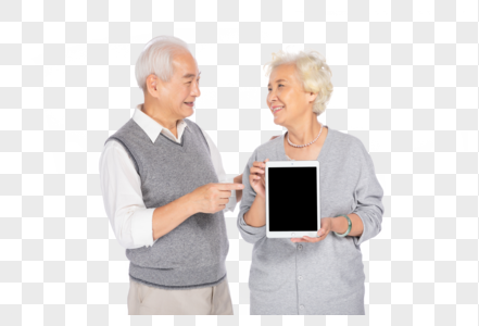 老年夫妻拿着平板电脑图片