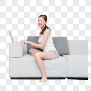 年轻女性客厅使用电脑休闲购物图片