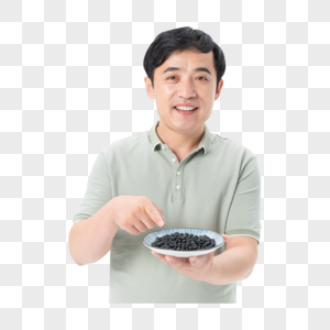 中年男性吃黑豆高清图片