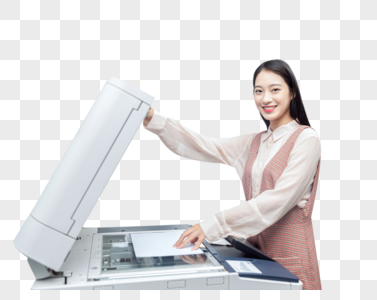 年轻女职员操作打印机图片