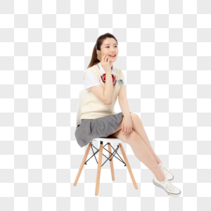 坐着使用绘画的女高中生年级一高中手机图片