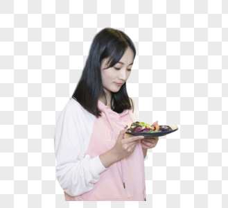 拿着美食的居家女性图片