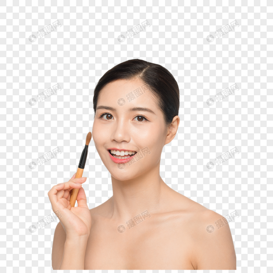 美女使用化妆刷闭眼图片