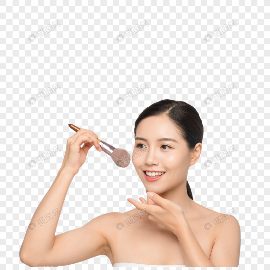 美女使用化妆刷闭眼图片