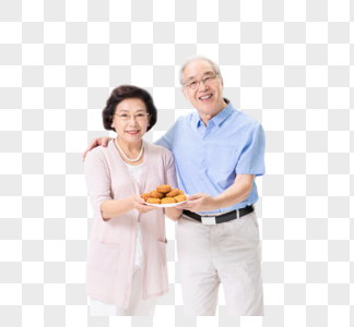 老年夫妇手端月饼图片
