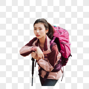 用登山杖爬山的女性形象图片