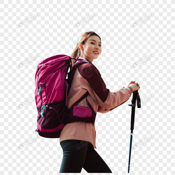 用登山杖爬山的女性形象图片