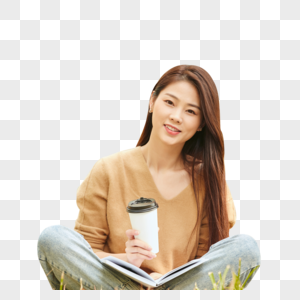 年轻女性看书喝咖啡图片