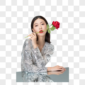 手拿玫瑰花的时尚女性高清图片