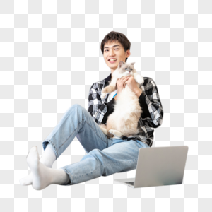 居家办公的男孩与宠物猫图片