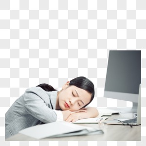 商务女性加班劳累趴桌子睡觉图片