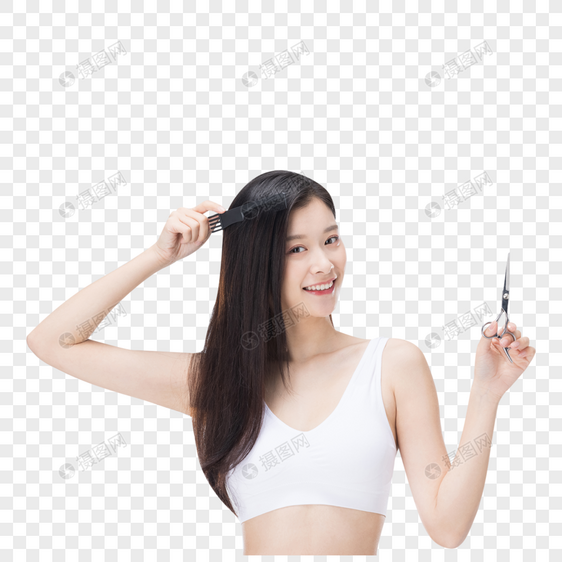 年轻女性使用梳子梳头发图片