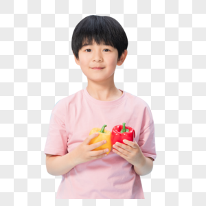 可爱小男孩拿彩色甜椒图片