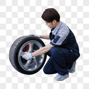 汽车修理工人拆卸汽车轮胎高清图片