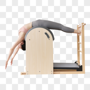 瑜伽女孩普拉提稳踏椅训练图片