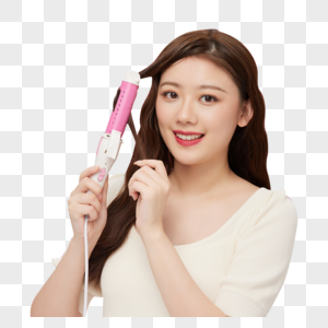 韩系美女使用卷发棒做造型高清图片