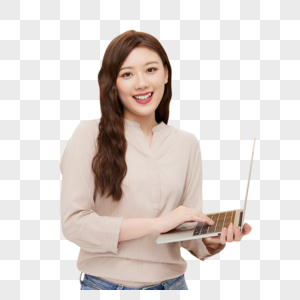 青年女性使用笔记本电脑办公图片