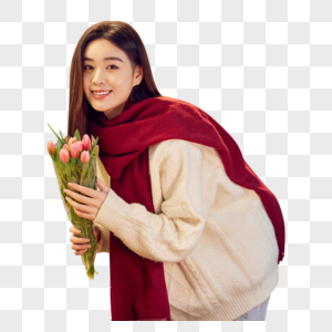 冬日女性手拿鲜花图片