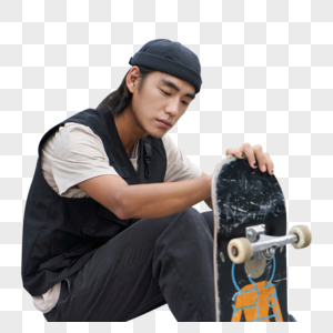 青年男性手拿滑板形象图片