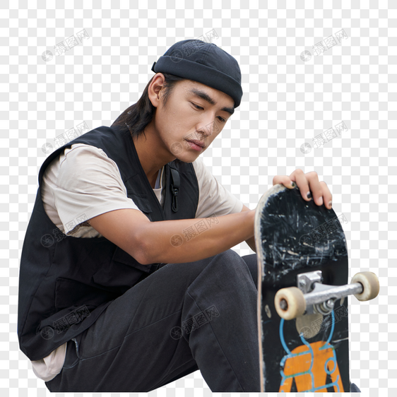 青年男性手拿滑板形象图片