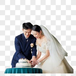 婚礼上切蛋糕的新郎新娘图片