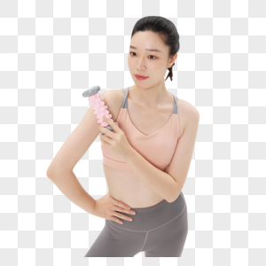 青年女性健身后使用器材放松肌肉图片