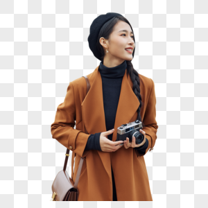青年女性户外散步手拿相机形象图片