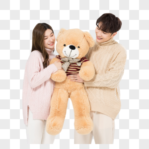 韩系情侣抱着绒毛玩偶熊图片