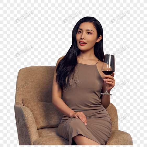 酒会坐在沙发手拿红酒杯的成熟女士图片