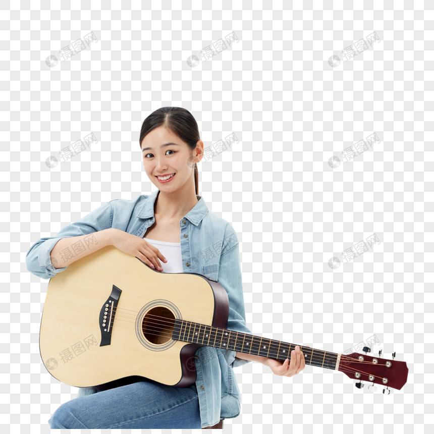 弹吉他的青年女性图片