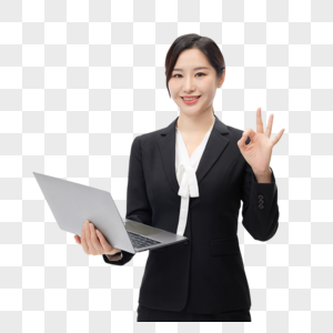 手拿电脑表示赞同的商务女性图片
