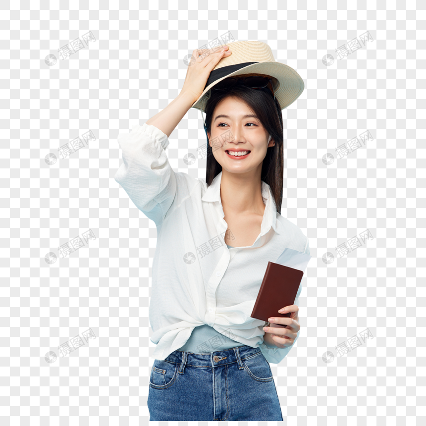 戴草帽的青年女子手拿护照和机票图片