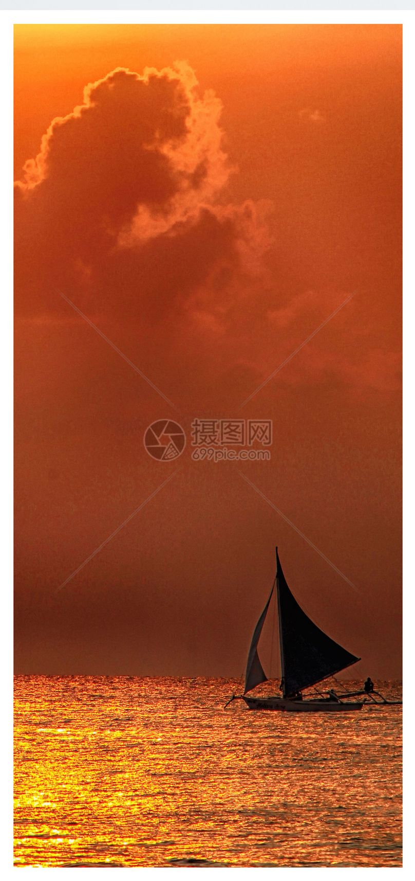 余晖下的帆船手机壁纸