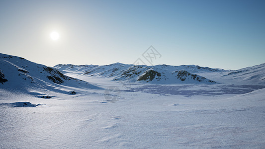 南极雪山冰冷海岸的空中景观背景图片