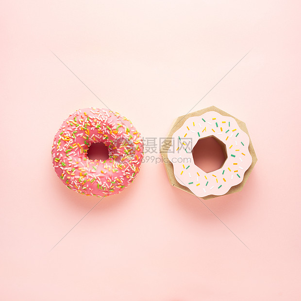 创意,静物健康饮食照片,真正的甜甜圈糕点,甜点,垃圾食品张纸粉红色的背景图片