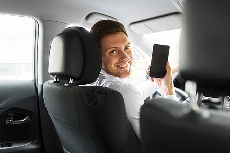 运输,驾驶技术人或汽车司机智能手机智能手机的人或汽车司机图片