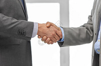 商人,合作,伙伴关系交易的密切的商人办公室握手商人办公室握手图片