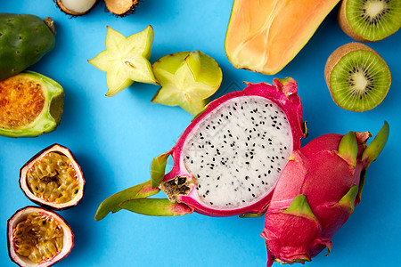 食物,夏天健康的饮食同的异国水果蓝色背景蓝色背景上同的异国水果图片