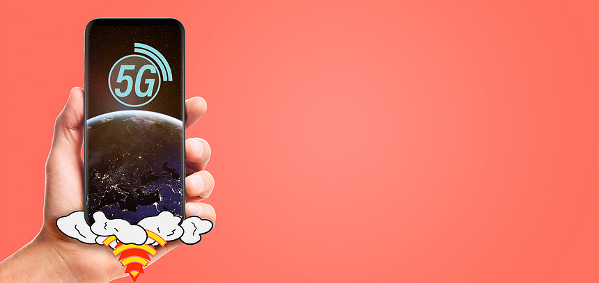 男手握启动5G智能手机与行星地球屏幕上,孤立活珊瑚背景这幅图像的元素由美国宇航局提供手握5g智能手机图片
