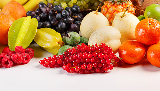 新鲜热带水果收获堆隔离白色背景上,并有文本的新鲜水果堆白色上背景图片
